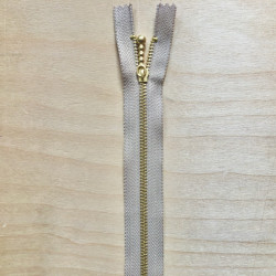Zipper with "gold"...