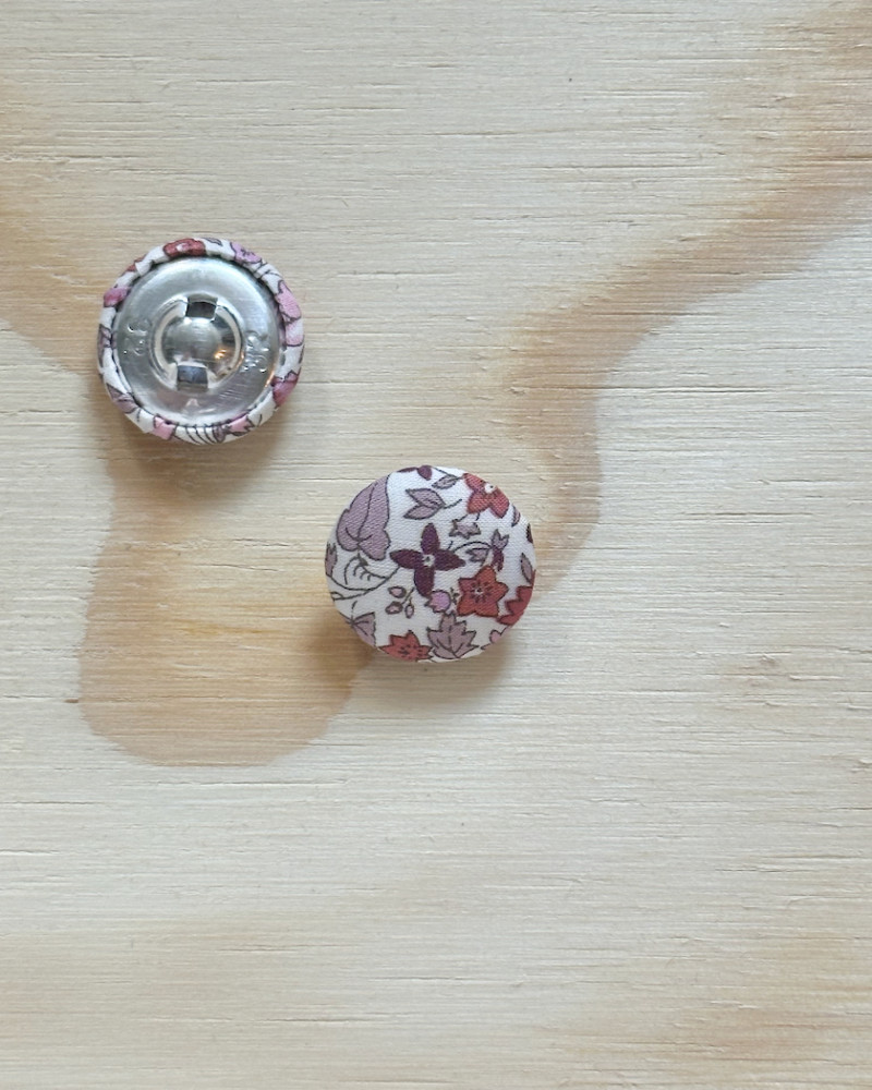 Stofbetrukken knap med...