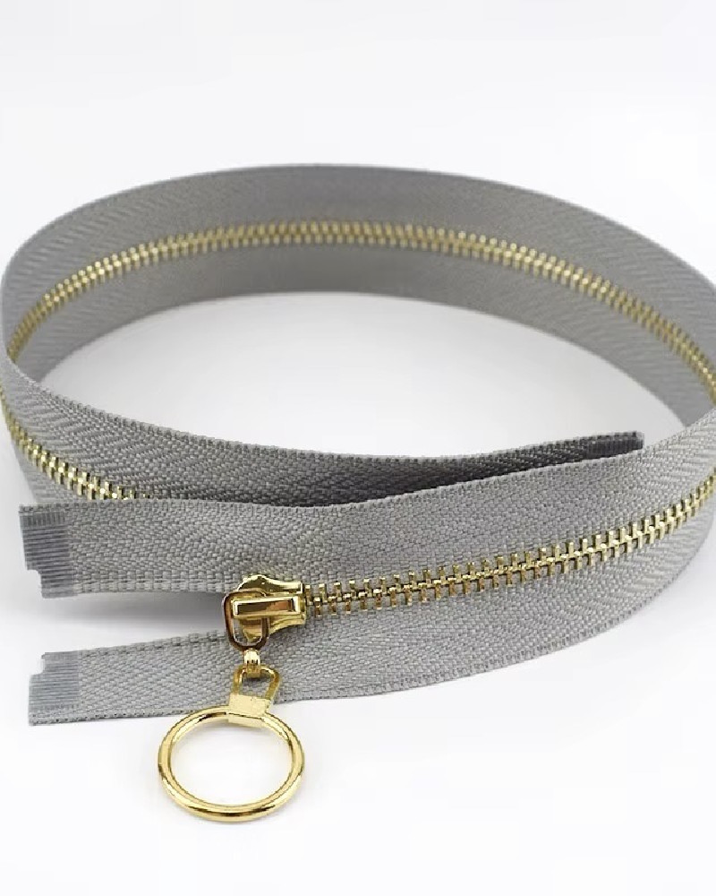Zipper with "gold" ring...