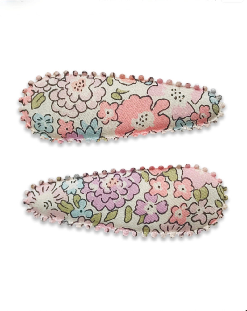 2 small hairclips with...